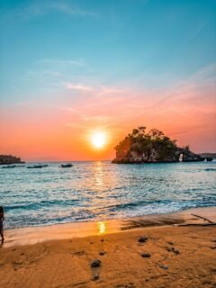 1 day 1 night nusa penida tour package 3 Beautiful sunset over the ocean at Crystal Bay Beach, Nusa Penida, Bali, Indonesia.